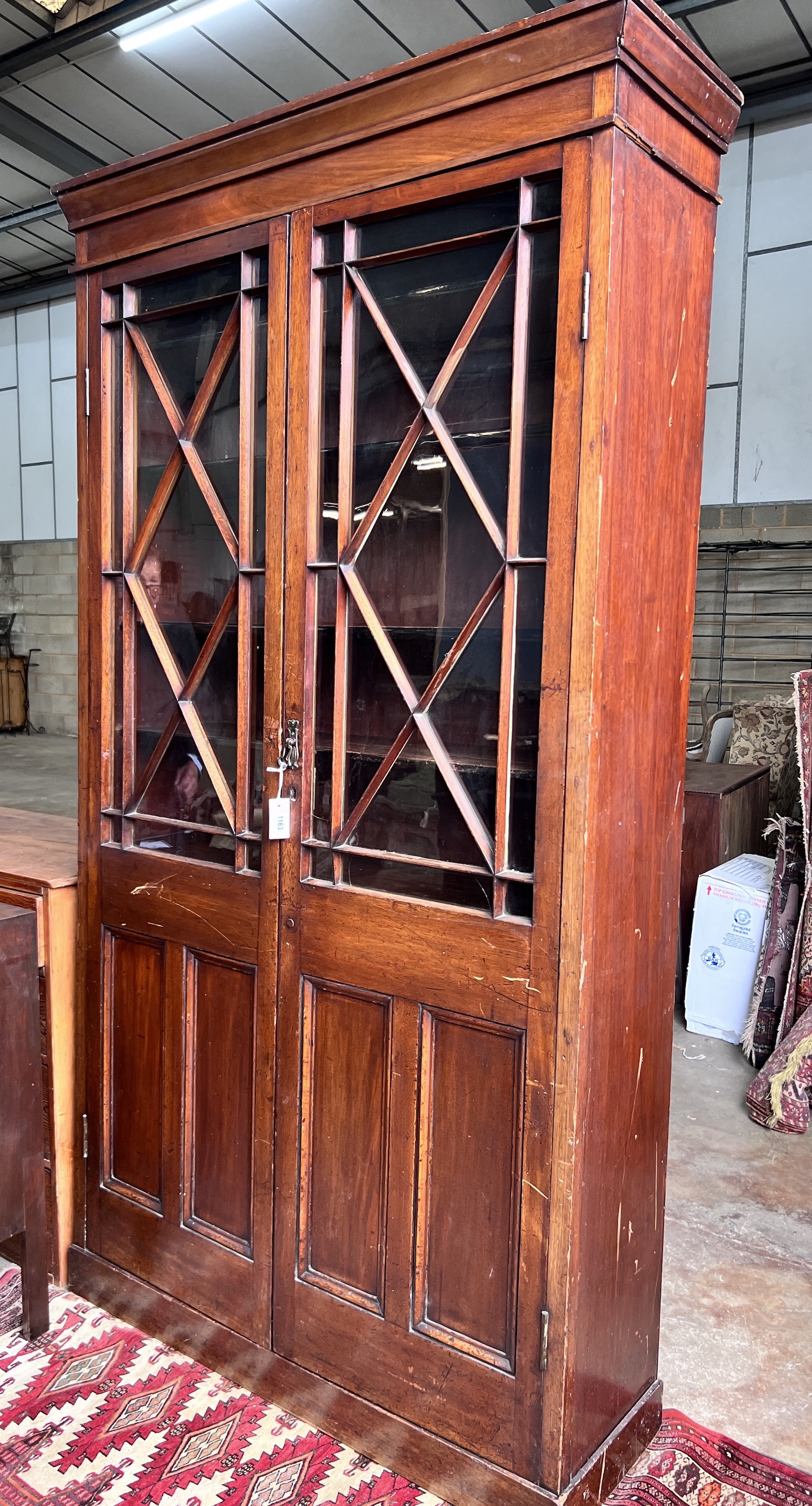 A Victorian glazed mahogany bookcase, length 120cm, depth 39cm, height 228cm